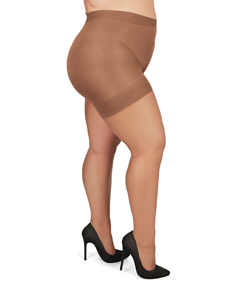 Side of a model wearing a size 3X-4X Plus Size Curvy Ultra Sheer Control Top Pantyhose in Utopia by Memoi. | dia_product_style_image_id:299548